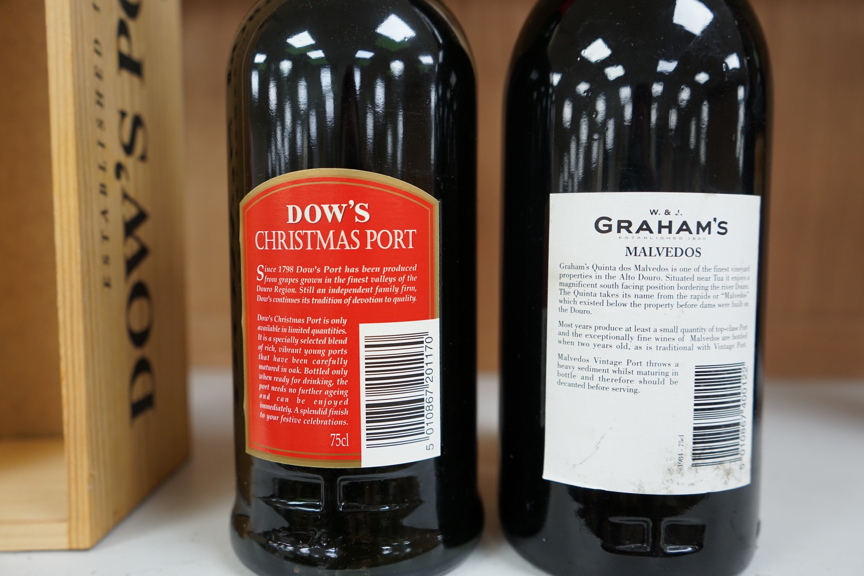 A bottle of Graham's Malvedas 1984 vintage port and a Dow's boxed Christmas port (2). Condition - good.